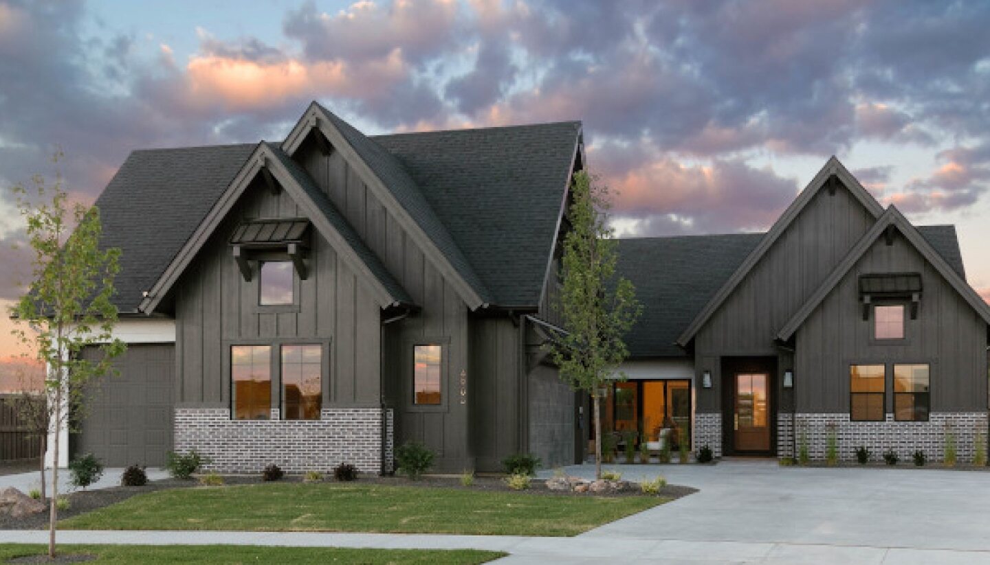 house with attached garage after new siding from an exterior contracting company