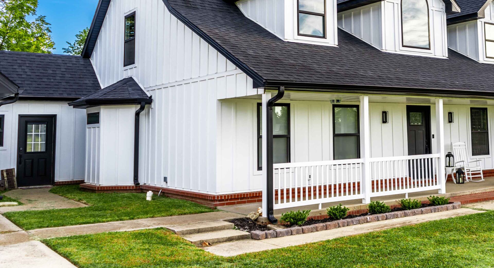 White home with dark shingles in the exterior visualizer example three quarter view left cropped in