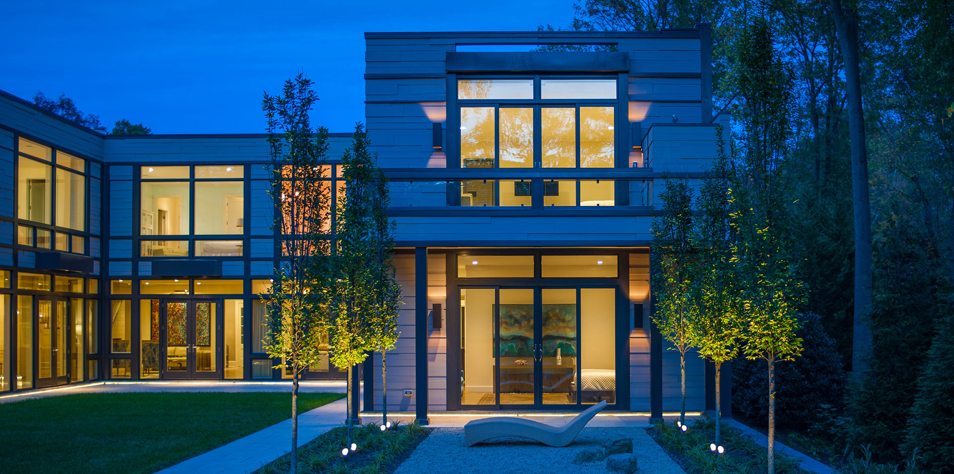 Windsor windows installation at dusk on large modern home