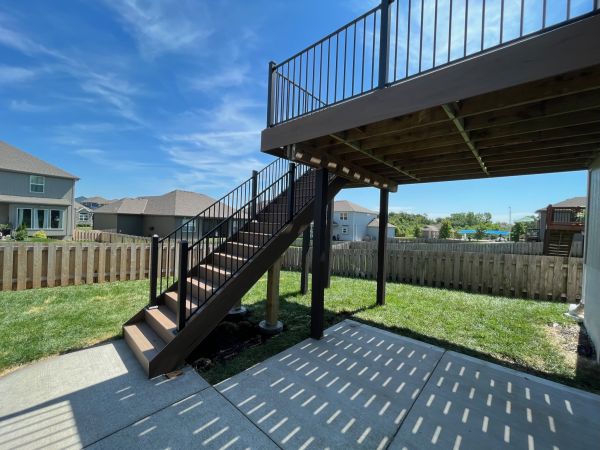 stairs of a deck resurfaced with composite materials by Xtreme Exteriors