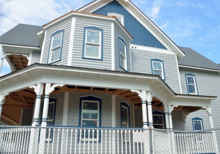 a wood home with traditional Dutch lap siding