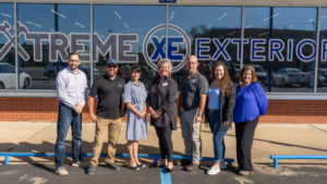 Xtreme Exteriors team in front of storefront Xtreme Exteriors in Nixa, MO