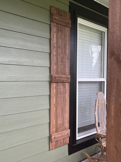 closeup of green James Hardie lap siding