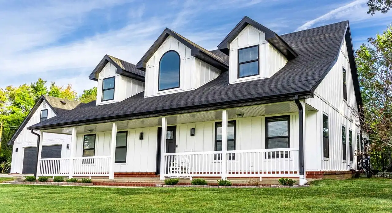 White home with dark shingles in the exterior visualizer example three quarter view