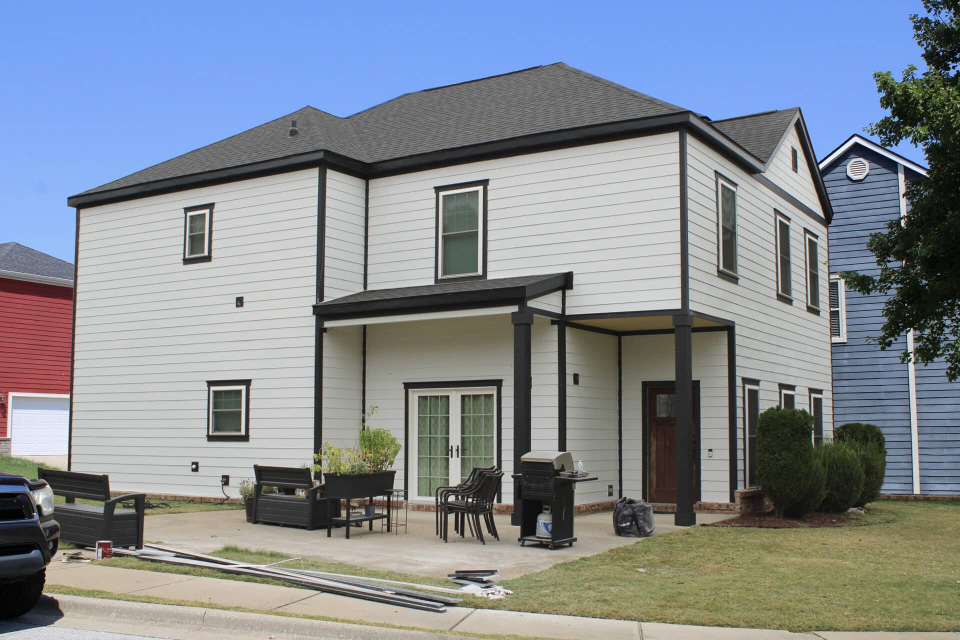 Side-by-side comparison of home exterior before and after modern siding refresh Xtreme Exteriors, Springdale, AR.