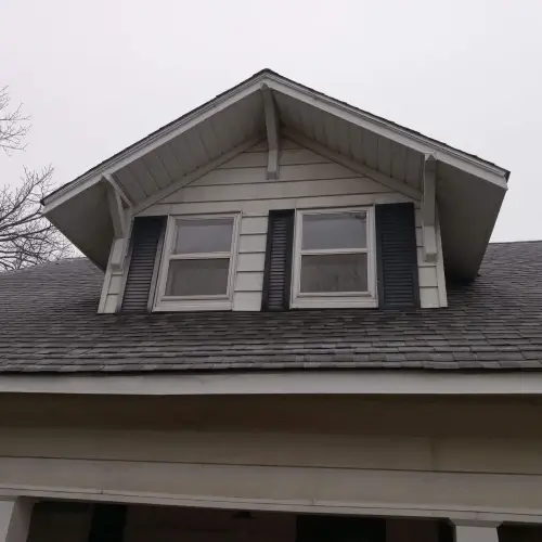 A close-up of a residential roof with damaged shingles, a clear sign that a full exterior inspection and siding maintenance is needed from Xtreme Exteriors in Goodlettsville.