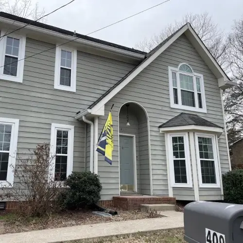 Well-maintained residential home with fresh siding, highlighting siding maintenance Nixa by Xtreme Exteriors in Nixa, MO