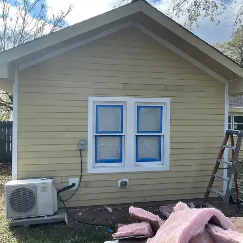 Home exterior in progress during siding maintenance in Pittsburg, handled by Xtreme Exteriors Nixa MO