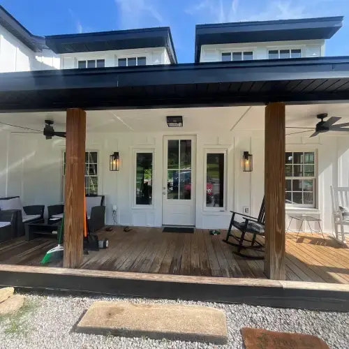 Clean, modern porch and freshly maintained white siding, demonstrating siding maintenance Sikeston by Xtreme Exteriors in Nixa, MO