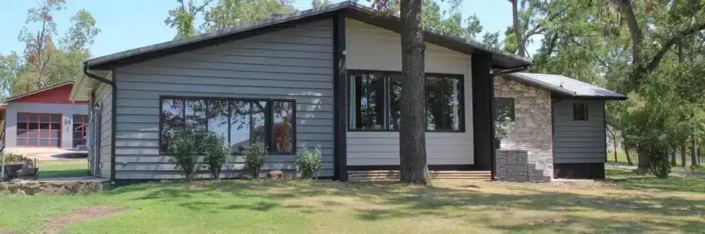 Modern home exterior showcasing professional siding maintenance in Springdale