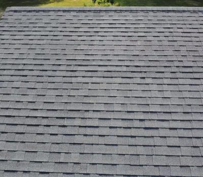 Upgraded metal roof home with professional roofing and guttering installation in San Antonio, TX.